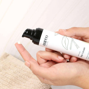 GlowGuard Anti-Aging Cream in hand application scene