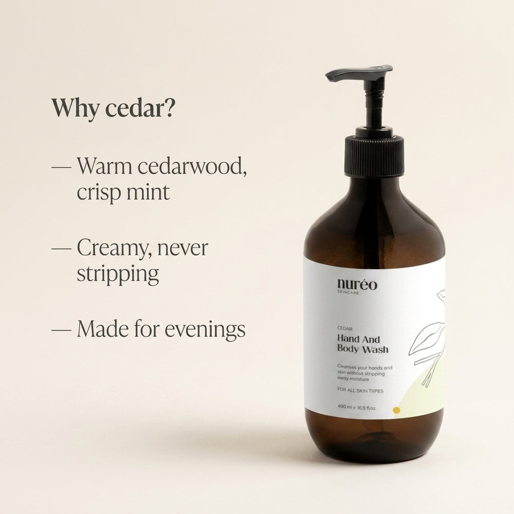 nuréo Cedar Hand & Body Wash on a wooden bath shelf
