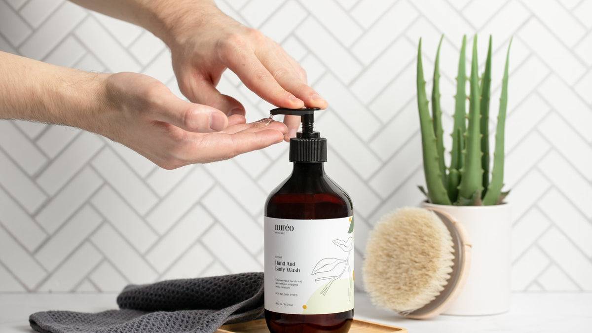 nuréo Cedar Hand and Body Wash in a bathroom setting